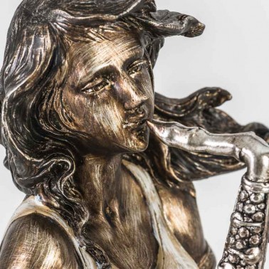 Figura mujer tocando el saxo  Figuras y Jarrones